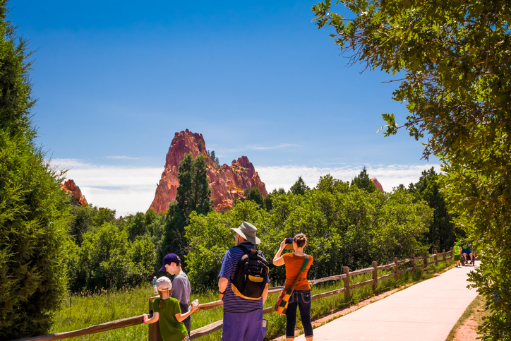 Family taking a guided hike in the Garden of The Gods, Colorado Springs